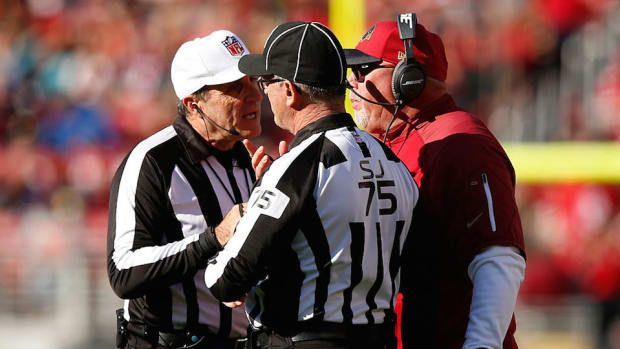 nfl_officials_huddle.jpg